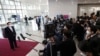 South Korean President Yoon Suk Yeol answers reporters' questions upon his arrival at the presidential office in Seoul, Nov. 18, 2022. Yoon has suspended his routine morning Q&A sessions with journalists.