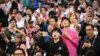 Fans react after not seeing Inter Miami's Argentine forward Lionel Messi play in the friendly football match between Hong Kong XI and U.S. Inter Miami CF in Hong Kong, Feb. 4, 2024.