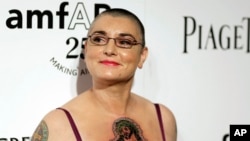 FILE - Irish musician Sinead O'Connor arrives at amfAR's Inspiration Gala in Los Angeles, Oct. 27, 2011. 