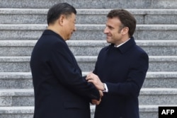 法國總統馬克龍與中國國家主席習近平在北京舉行的歡迎儀式上。 （2023年4月6日）