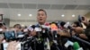 Thailand's Prime Minister Srettha Thavisin talks to reporters on his arrival at Parliament in Bangkok, Thailand, Monday, Sept. 11, 2023.