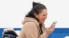 FILE - Liat Beinin, 49, an Israeli American, speaks with family, Nov. 29, 2023, having just been freed from Hamas captivity. Two Palestinian American families' lawsuit says the U.S. has not done as much to evacuate their U.S. relatives as it did for Israeli dual nationals.
