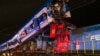 Police and firefighters inspect two trains that collided in San Bernardo, Santiago, Chile, June 20, 2024.