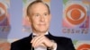 FILE - Tom Smothers does yo-yo tricks during arrivals at CBS's 75th anniversary celebration Nov. 2, 2003, in New York. 