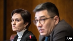 FILE - Evgenia Kara-Murza, left, wife of Kremlin critic Vladimir Kara-Murza looks on next to Sergei Davidis, head of the political prisoners support program at the Memorial human rights center, during a press conference in Geneva on March 25, 2024.