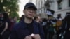 FILE - Hong Kong activist Nathan Law attends a candlelight vigil outside the Chinese embassy in London, June 4, 2023, to mark the anniversary of China's bloody 1989 crackdown on pro-democracy protests in Beijing's Tiananmen Square.
