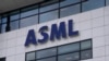 FILE - The logo of ASML, a leading maker of semiconductor production equipment, hangs on the head office in Veldhoven, Netherlands, Jan. 30, 2023. ASML dominates the global market for lithography systems, which use lasers to help create chip circuitry.