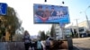 Një poster elektoral i Partisë "Rusia e Bashkuar" në territoret e pushtuara ukrainase në Donetsk (7 shtator 2023)
