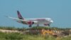 Un vol de Kenyan Airlines a atterri à l'aéroport international de Toussaint Louverture, le 25 juin 2024.