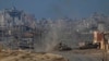 Israeli army tanks are seen in Wadi Gaza, central Gaza Strip, June 26, 2024.