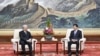 中共中央政治局常委王沪宁(右）2023年2月10日在北京会见台湾最大在野党中国国民党副主席夏立言。(中国国民党提供)