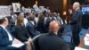 During a U.S. Senate hearing in Washington on June 18, 2024, Boeing CEO Dave Calhoun apologizes to relatives of victims of Boeing 737 Max crashes in 2018 and 2019. Some of those at the hearing held up photos of loved ones who died in the two crashes, which killed a total of 346.