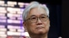 FILE - Andrew Hsia, deputy chairman of Taiwan's main opposition party the Kuomintang, speaks to the media before traveling to China at Taoyuan International airport in Taoyuan, Taiwan, Feb. 8, 2023.