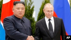 Kim Jong Un dhe Vladimir Putin