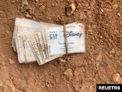 Waste from international clothing brands is stored before being used to fuel kilns at a brick factory on the outskirts of Phnom Penh, Cambodia April 27, 2023. (LICAHDO via REUTERS)