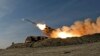 In this photo released by the Iranian Army on Jan. 19, 2024, a missile is launched during a military drill in southern Iran. 