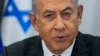 FILE - Israeli Prime Minister Benjamin Netanyahu chairs a Cabinet meeting at the Kirya military base, which houses the Israeli Ministry of Defense, in Tel Aviv, Israel, on Dec. 24, 2023.