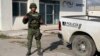 FILE - A Mexican army soldier guards the Tamaulipas State Prosecutor's headquarters in Matamoros, Mexico, March 8, 2023. Thirty-one migrants were abducted in the state Saturday.
