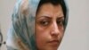 FILE - Iranian human rights activist Narges Mohammadi is pictured at a meeting on women's rights in Tehran, Iran, Aug. 27, 2007. Mohammadi led a hunger strike by Iranian dissidents Jan. 25, 2024, to protest a surge of hangings in Iran.