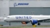 FILE - A Boeing 737 Max 9 built for United Airlines lands at King County International Airport - Boeing Field after a test flight, in Seattle, Nov. 18, 2020.