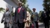 FILE - Ernest Bai Koroma, center, then-president of Sierra Leone, is seen during a visit to Banjul, Gambia, Dec. 13, 2016. Koroma has been charged with treason for his alleged involvement in a failed coup in November, Sierra Leone's government said Jan. 3, 2024.