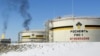 FILE - Reservoirs seen at Priobskoye oil field near Nefteyugansk, in western Siberia, Russia, on April 5, 2006. 