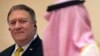 U.S. Secretary of State Mike Pompeo, left, listens to Saudi Arabia's Foreign Minister Adel al-Jubeir, during a joint press conference at the Royal Terminal of King Khaled airport, in Riyadh, Saudi Arabia, Sunday, April 29, 2018. 