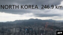 A sticker on a window indicates the distance to the North Korean capital, Pyongyang, at the landmark Namsan Tower in Seoul on Oct. 6, 2022. 