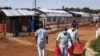 Maafisa wa afya wakiwa nje ya kituo maalum kwa ajili ya wagonjwa wa Ebola katika hospitali ya rufaa ya Mubende, Uganda. Sept 29 2022. PICHA: AP

