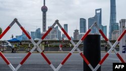 资料照：从上海外滩遥望陆家嘴。(2022年6月10日)