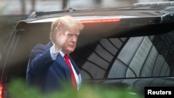 FILE - Donald Trump departs Trump Tower two days after FBI agents raided his Mar-a-Lago Palm Beach home, in New York City, New york, U.S., August 10, 2022.