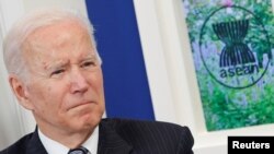 FILE - U.S. President Joe Biden participates virtually with the ASEAN summit from an auditorium at the White House in Washington, U.S. October 26, 2021. 