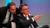 Le président brésilien Jair Bolsonaro avec son fils Carlos à Rio de Janeiro, Brésil, jeudi 29 septembre 2022. 