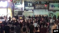FILE - Protesters take to the streets of Sanandaj, the capital of Iran's Kurdistan province, Sept. 28, 2022, as demonstrations continue to spread nearly two weeks after the death of Mahsa Amini in custody, in this screen grab taken from a UGC video.