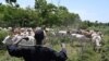 Un éleveur fulani surveille ses vaches près de Ouangolodougou, dans le nord de la Côte d'Ivoire, à proximité des frontières du Burkina Faso et du Mali.