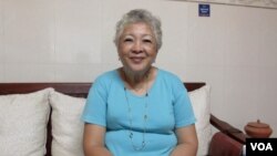 លោក​ស្រី​ ធីតា ឃិះ