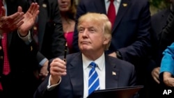 Donald Trump à la Maison Blanche, le 27 mars 2017. 