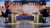 Le président français et candidat à sa propre réélection Emmanuel Macron (à g.) et la candidate de l'opposition Marine Le Pen participent à un débat télévisé en direct, mercredi 20 avril 2022.