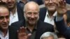 FILE - Mohammad Qalibaf, center, is surrounded by lawmakers after being elected as speaker of the parliament, in Tehran, Iran, May 28, 2020. Qalibaf registered his candidacy June 3, 2024, for the country’s June 28 presidential election.