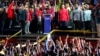 Venezuela's President Nicolas Maduro raises a finger as he is surrounded by supporters while speaking during a gathering after the results of the election were released, outside of the Miraflores Palace in Caracas, Venezuela, May 20, 2018. 