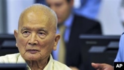 ​នួន ជា អតីត​អគ្គលេខាធិការរង​នៃ​គណបក្ស​កុម្មុយនិស្ត​កម្ពុជា នៅ​ក្នុង​​​សវនាការ​​ជំនុំ​ជម្រះ​​នៅសាលាក្តីខ្មែរក្រហម​