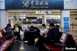 北京國際機場候機的旅客(2022年12月27日)