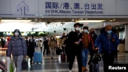 北京國際機場的旅客（資料照片，2022年12月27日）