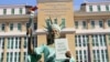 FILE - Cambodian-U.S. lawyer Theary Seng arrives dressed up as a chained Statue of Liberty for her treason verdict at Phnom Penh Municipal Court, in Phnom Penh, Cambodia June 14, 2022.
