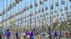 Birds sit in cages during a bird singing competition in Thailand's southern province of Narathiwat, Sept. 21, 2022.