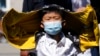 China's Zero-COVID Restrictions Curb May 1 Holiday Travel 