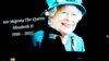 People pass by an image of Queen Elizabeth II projected onto a large screen at Piccadilly Circus, in London, Sept. 8, 2022.
২০২২ সালের ৮ সেপ্টেম্বর লন্ডনের পিকাডিলি সার্কাসে ২০২২ সালের ৮ সেপ্টেম্বর একটি বড় পর্দায় রানী দ্বিতীয় এলিজাবেথের প্রদর্শিত একটি ছবি।