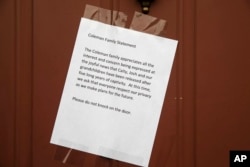 A message from Jim and Lyn Coleman is posted on their home in Stewartstown, Pa., Oct. 12, 2017. The Coleman's daughter Caitlan Coleman, her Canadian husband and their three young children have been released after years held captive by a group that has ties to the Taliban and is considered a terrorist organization by the United States, U.S. and Pakistani officials said.
