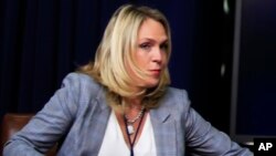 FILE - In this March 22, 2018, photo, special assistant to President Donald Trump, Kelly Sadler attends a forum at the Eisenhower Executive Office Building of the White House complex in Washington.