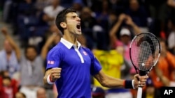 Novak Djokovic réagissant suite à sa victoire face à Roger Federer, lors de l’U.S. Open, le 13 septembre 2015. 